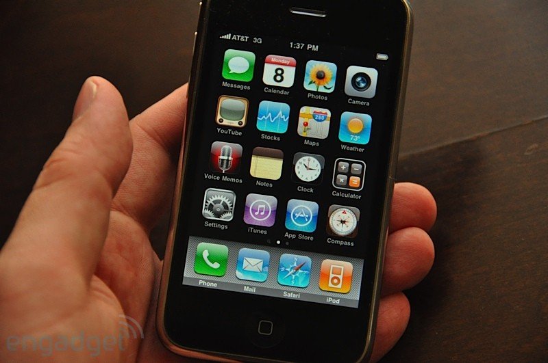 Person holding iPhone 3G series