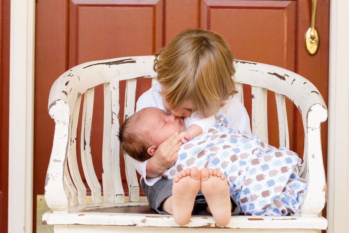 The Magic of Bringing a Baby into the World brothers-boys-kids-baby-50601
