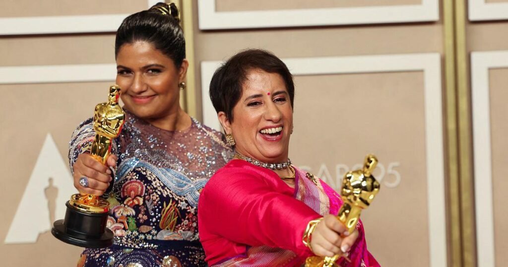Kartiki Gonsalves and Guneet Monga accept the Best Documentary Short Subject award for "The Elephant Whisperers" onstage during the 95th Annual Academy Awards at Dolby Theatre on March 12, 2023, in Hollywood, California. 