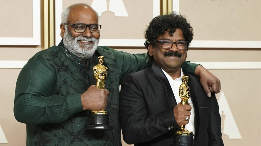 M.M. Keeravaani, left, and Chandrabose, winners of the award for Best Original Song for ‘Naatu Naatu’ from ‘RRR’ pose in the press room at the Oscars | Photo Credit: AP