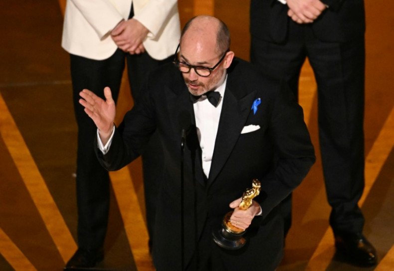  Edward Berger accepts the Oscar forBest International Feature Film for "All Quiet on the Western Front" during the Oscars show at the 95th Academy Awards in Hollywood, Los Angeles, California, U.S., March 12, 2023.  